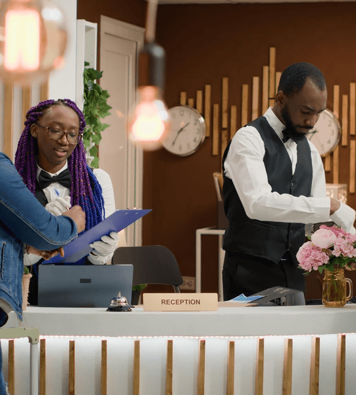 Hotel reception with staff members